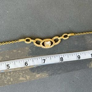 Beautiful CZ and gold plate necklace.  Perfect for any dressy occasion.